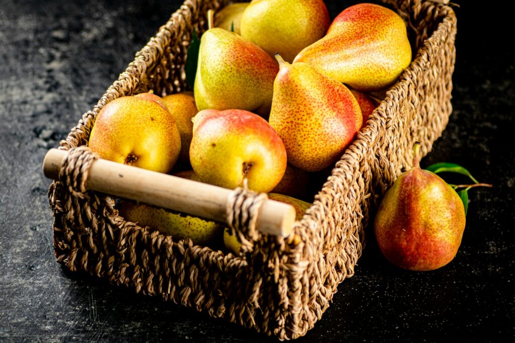 Fresh pears in a basket.